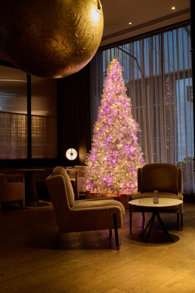 Susan Fang’s Ethereal Take on The Festive Londoner
'Tis the season and one of London's super boutique hotels, The Londoner has pulled off the most magnificent seasonal coup: a collaboration with visionary designer SUSAN FANG. And honestly, it’s giving us a dizzying case of the festive swoons. 

Forget the dreary, predictable pines. Fang, known for her dreamy, floaty, altogether otherworldly aesthetic, has delivered a "Crystal Dream Christmas Tree" that’s less Tannenbaum and more transcendental installation. This isn't just decoration; it's a poetic fusion of technology and pure, crystalline joy.

Picture it: towering in the lobby, a sculptural vision of white, transparent spheres, and oversized, blush-hued 3D-printed flowers. It shimmers, it glows, it breathes! It’s like stepping into a pastel-hued snow globe where the air itself has crystallised into exquisite art. Fang's genius is that she uses layers of transparent bubbles and iridescent spheres to create an illusionary transparency, echoing her fascination with "Air-Flora Fantasy." It’s luminous, weightless, and frankly, captivating.

The whole thing is an homage to love and purity -- a futuristic romance bottled in glass-like blooms. It’s inventive, it’s emotive, and it perfectly encapsulates The Londoner’s commitment to curating experiences that simply refuse to be ignored.